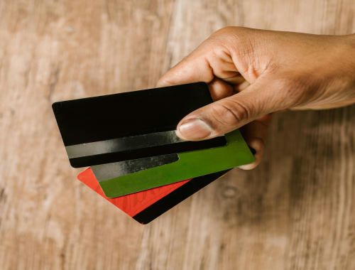Hand holding credit cards