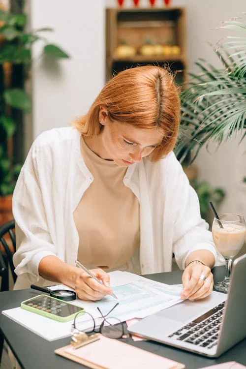 Person reviewing tax documents, worried about CRA debt